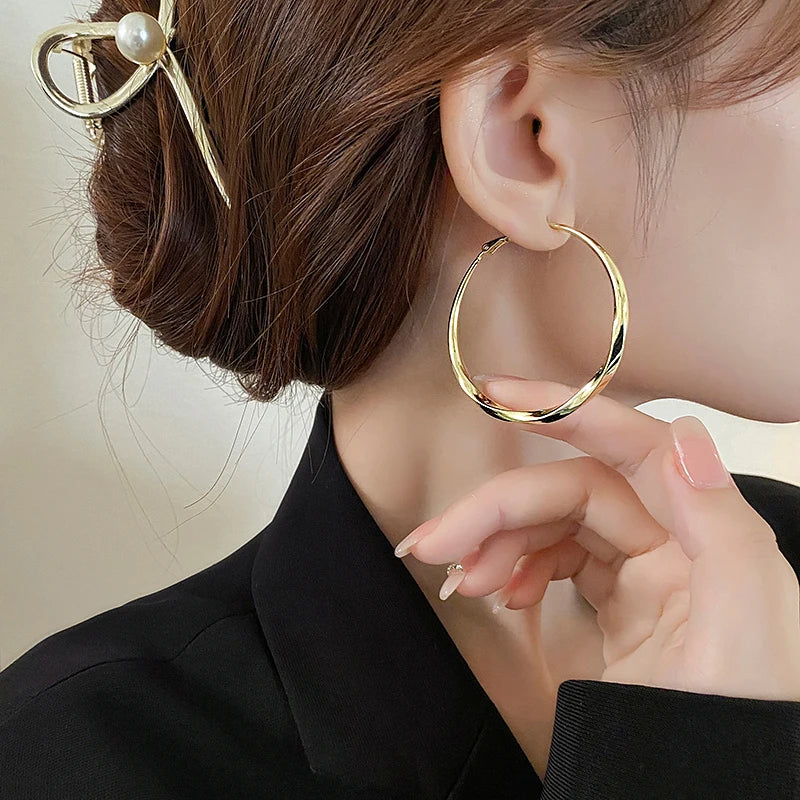 Luxury Gold Mobius Hoop Earrings – 50mm Minimalist Design for Women